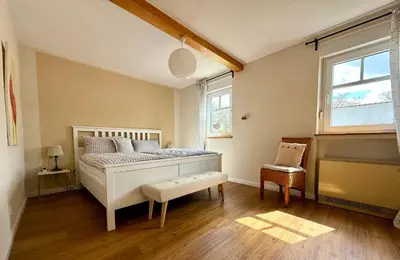 Ein Bett oder Betten in einem Zimmer der Unterkunft Landhaus Laux