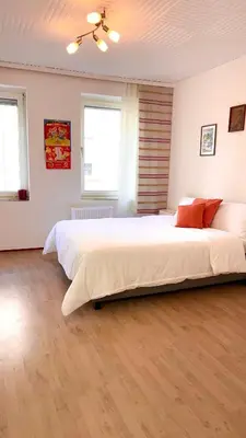 Ein Bett oder Betten in einem Zimmer der Unterkunft Vinaring Homestay