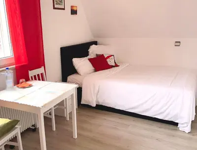 Ein Bett oder Betten in einem Zimmer der Unterkunft Vinaring Homestay
