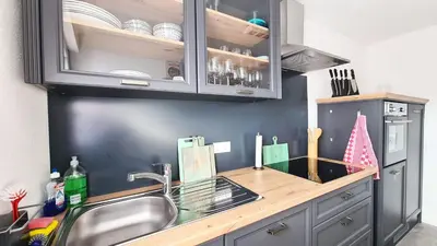 Küche/Küchenzeile in der Unterkunft Weinstock - klimatisierte Ferienwohnung mit Sonnenterrasse