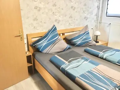 Ein Bett oder Betten in einem Zimmer der Unterkunft Schöne Ferienwohnung in Hilscheid Hunsrück