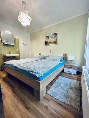 Ein Bett oder Betten in einem Zimmer der Unterkunft Ferienwohnung Sonneck
