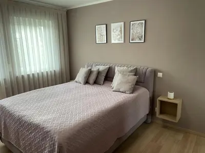 Ein Bett oder Betten in einem Zimmer der Unterkunft Auszeit für Genießer am Mittelrhein, Koblenz