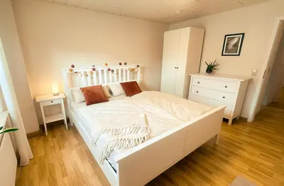 Ein Bett oder Betten in einem Zimmer der Unterkunft Gemütliche Ferienwohnung in der Eifel - nähe Mosel