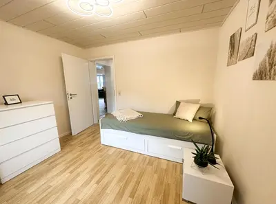 Ein Bett oder Betten in einem Zimmer der Unterkunft Gemütliche Ferienwohnung in der Eifel - nähe Mosel