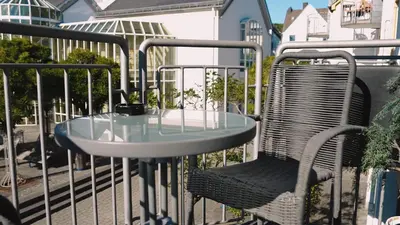 Ein Balkon oder eine Terrasse in der Unterkunft Apartment mit Balkon, Küche & Waschmaschine an der WHU