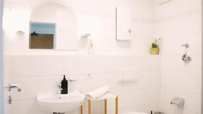 Ein Badezimmer in der Unterkunft Apartment mit Balkon, Küche & Waschmaschine an der WHU