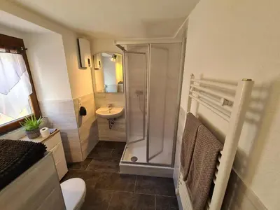 Ein Badezimmer in der Unterkunft Haus Kurtrier