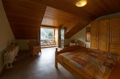 Ein Bett oder Betten in einem Zimmer der Unterkunft Weingut Gerhard Trossen