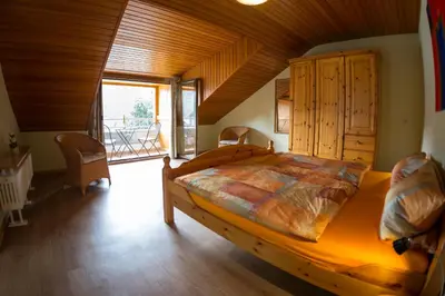 Ein Bett oder Betten in einem Zimmer der Unterkunft Weingut Gerhard Trossen
