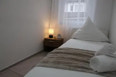 Ein Bett oder Betten in einem Zimmer der Unterkunft JAM Apartments