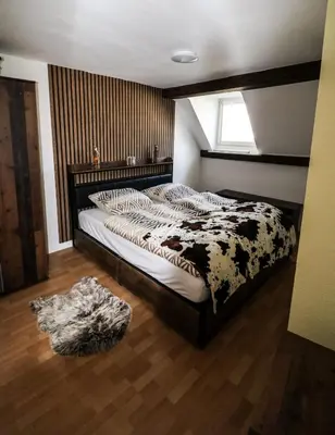 Ein Bett oder Betten in einem Zimmer der Unterkunft Ferienwohnung Afrika