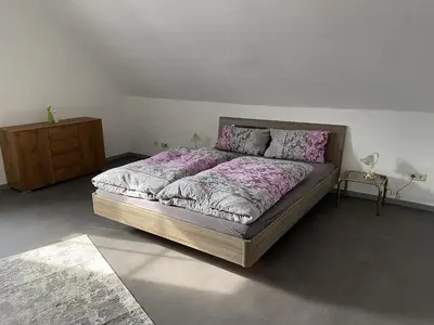Ein Bett oder Betten in einem Zimmer der Unterkunft Ferienwohnung Rosch
