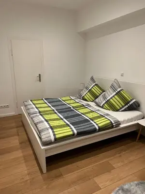Ein Bett oder Betten in einem Zimmer der Unterkunft Am Verwaltungszentrum Nähe Mosel