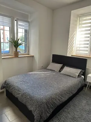 Ein Bett oder Betten in einem Zimmer der Unterkunft Ferienwohnung Louis