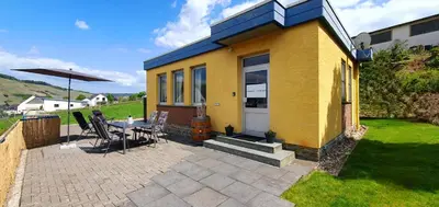 Ein Garten an der Unterkunft Ferienhaus Moselnest -Brauneberg - freistehend - klimatisiert