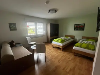 Ein Bett oder Betten in einem Zimmer der Unterkunft Ferienwohnung Schneider