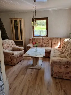 Ein Sitzbereich in der Unterkunft Ferienhaus Hochwald