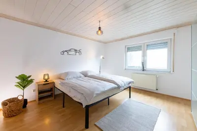 Ein Bett oder Betten in einem Zimmer der Unterkunft Pitlane-Apartment