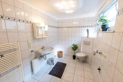 Ein Badezimmer in der Unterkunft Pitlane-Apartment