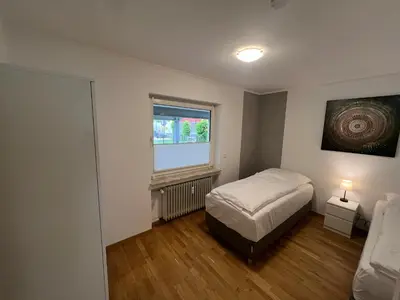 Ein Bett oder Betten in einem Zimmer der Unterkunft Ferienwohnung Eifelliebe