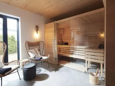Ein Sitzbereich in der Unterkunft Holiday home Chalet 48