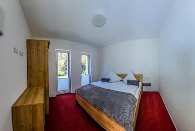 Ein Bett oder Betten in einem Zimmer der Unterkunft Ferienwohnung - Riesling Ambiente - im Weingut Andries