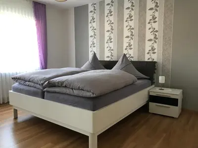 Ein Bett oder Betten in einem Zimmer der Unterkunft Ferienwohnung Eifelluft
