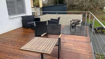 Ein Balkon oder eine Terrasse in der Unterkunft Hunsrück, nähe Mosel, das etwas andere Haus