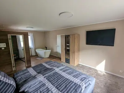 Ein Bett oder Betten in einem Zimmer der Unterkunft Wellness Appartement Cochem
