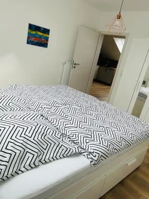 Ein Bett oder Betten in einem Zimmer der Unterkunft Bei Freddy