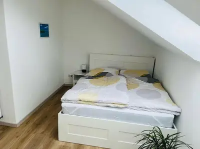 Ein Bett oder Betten in einem Zimmer der Unterkunft Bei Freddy