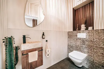 Ein Badezimmer in der Unterkunft GetAway Penthouse: Spa & Cinema