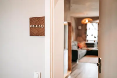 Ein Bett oder Betten in einem Zimmer der Unterkunft GetAway Penthouse: Spa & Cinema