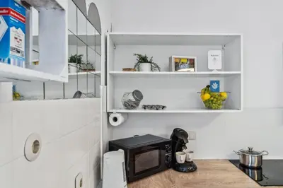 Küche/Küchenzeile in der Unterkunft Gemütliche & Charmante Wohnung