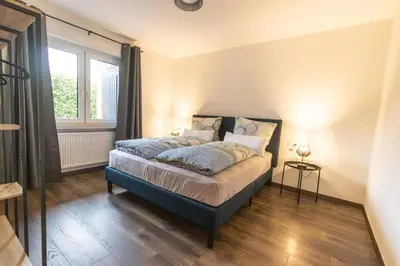 Ein Bett oder Betten in einem Zimmer der Unterkunft Südschleife Apartments - App. 3 - Direkt am Ring