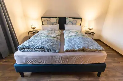 Ein Bett oder Betten in einem Zimmer der Unterkunft Südschleife Apartments - App. 3 - Direkt am Ring