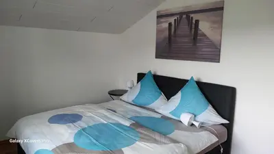 Ein Bett oder Betten in einem Zimmer der Unterkunft Hildes Nest