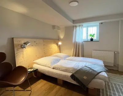 Ein Bett oder Betten in einem Zimmer der Unterkunft Kolberg Studio - Moderne Ferienwohnung in Boppard