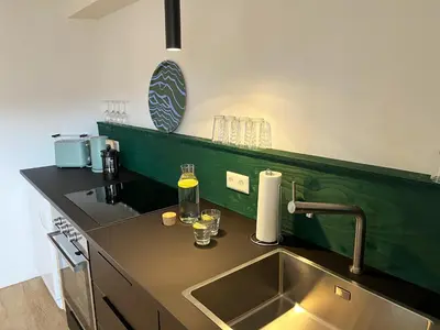 Küche/Küchenzeile in der Unterkunft Kolberg Studio - Moderne Ferienwohnung in Boppard