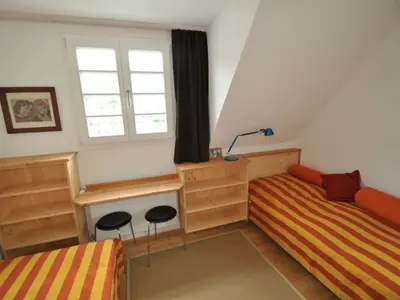 Ein Bett oder Betten in einem Zimmer der Unterkunft Haus Rosa Comfortable holiday residence