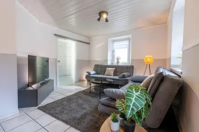 Ein Sitzbereich in der Unterkunft Lava-Lodge (Ferienhaus)