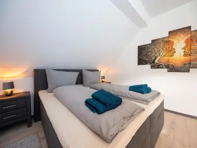 Ein Bett oder Betten in einem Zimmer der Unterkunft Serene Stay by the Moselle