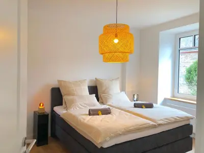 Ein Bett oder Betten in einem Zimmer der Unterkunft Modernes Apartement mit Balkon in Toplage!