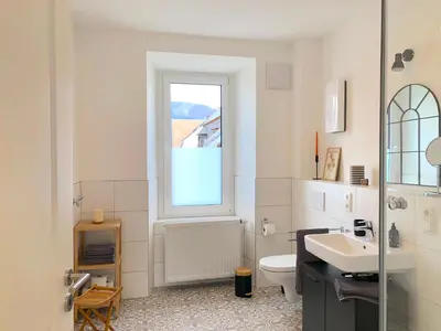Ein Badezimmer in der Unterkunft Modernes Apartement mit Balkon in Toplage!