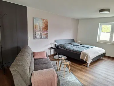 Ein Bett oder Betten in einem Zimmer der Unterkunft Fewo Hexamer