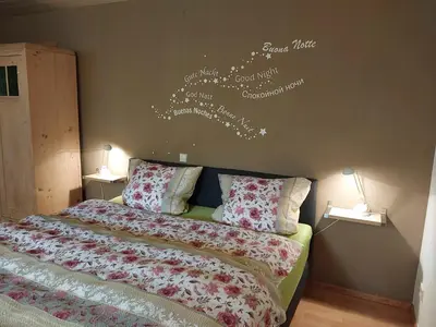 Ein Bett oder Betten in einem Zimmer der Unterkunft Ferienappartement Weisel
