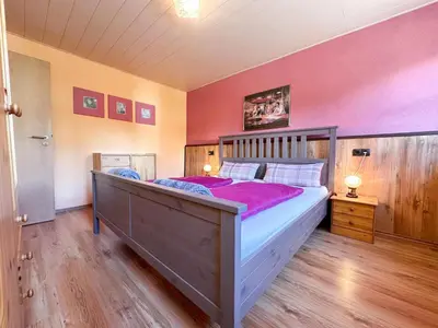 Ein Bett oder Betten in einem Zimmer der Unterkunft By Aenny