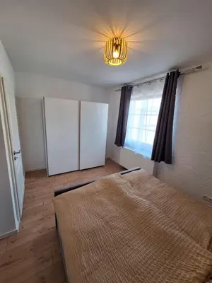 Ein Bett oder Betten in einem Zimmer der Unterkunft Zur alten Scheune