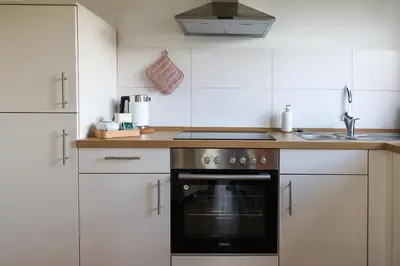 Küche/Küchenzeile in der Unterkunft Helle 4 ZKB mit Balkon in Wittlich
